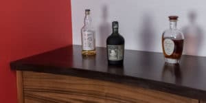 meuble courbe, ébène de Macassar et palissandre de Santos