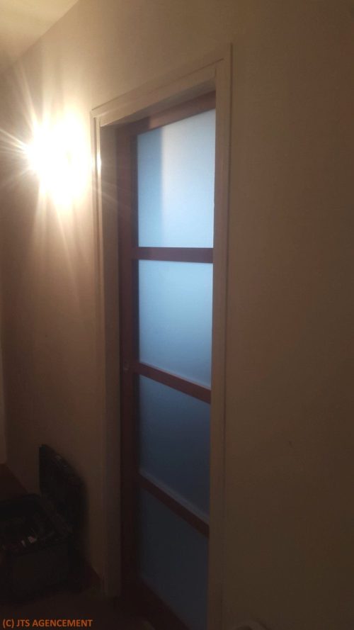 Porte coulissante en applique